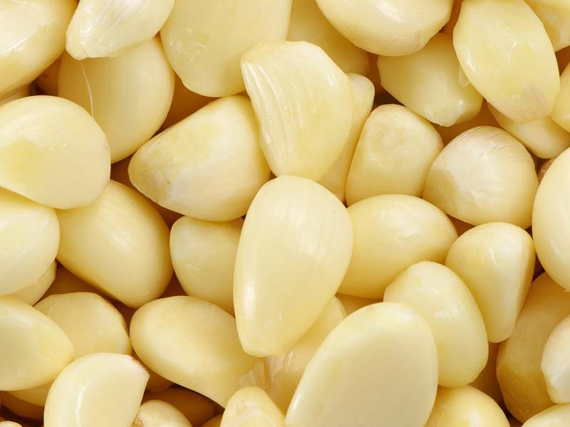 Linea di produzione di peeling all'aglio per spicchi d'aglio sbucciati